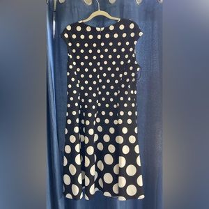 Black and white polka dot sleeveless dress